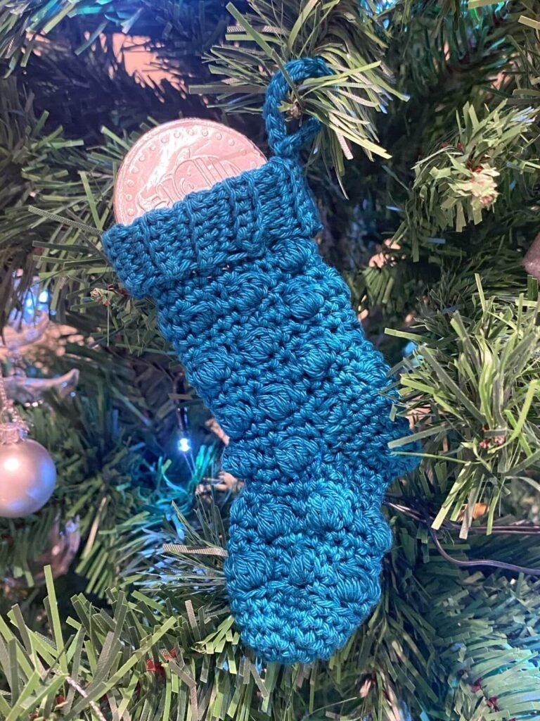 mini chocolate stocking hanging on a Christmas tree