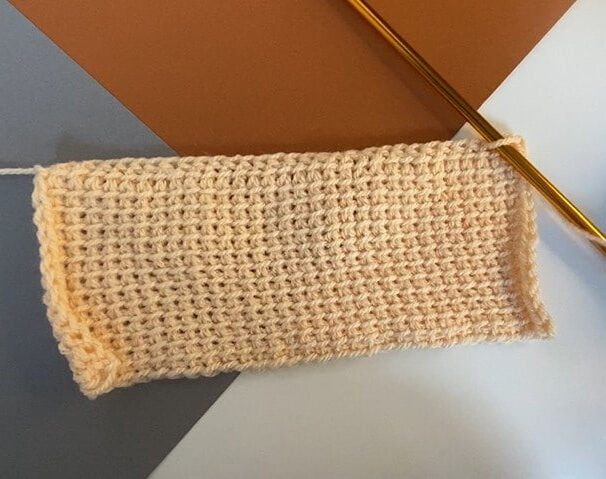 A rectangle of Tunisian Crochet showing tunisian simple stitch