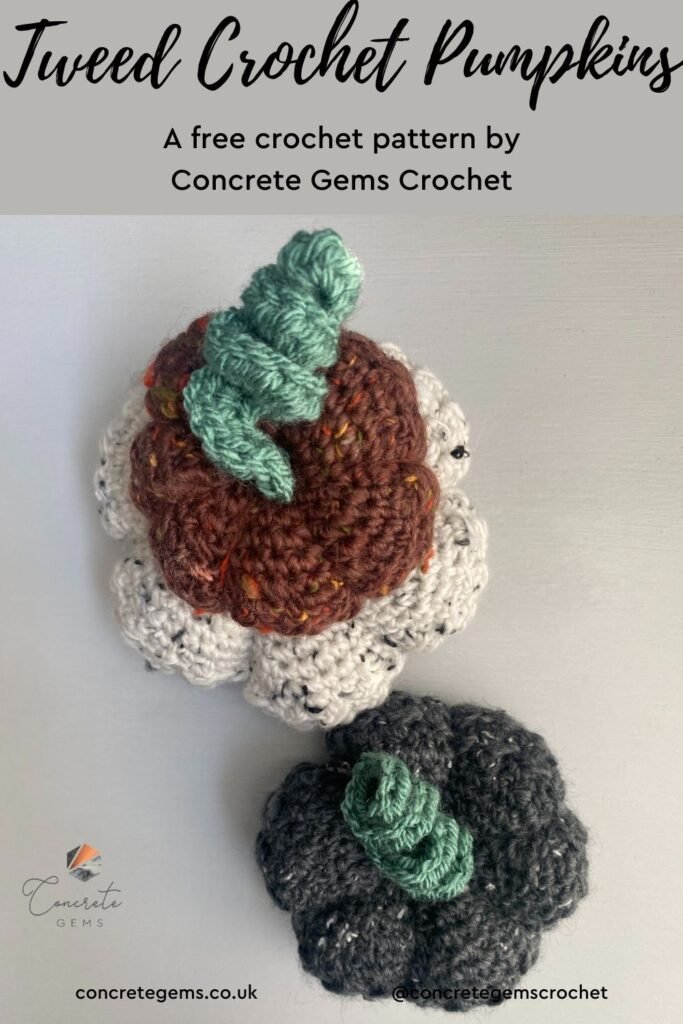 A pin image of 3 tweed crochet pumpkins in grey, white and red. The red one is on top of the white one and they have green curly stems