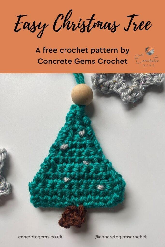 Close up of a green crochet tree with silver lights on a hanger with easy christmas tree crochet pattern wording