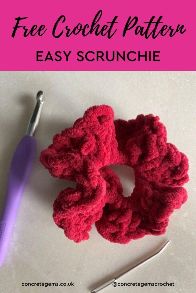 pin image of a free crochet scrunchie pattern showing a red crochet scrunchie, crochet hook and needle
