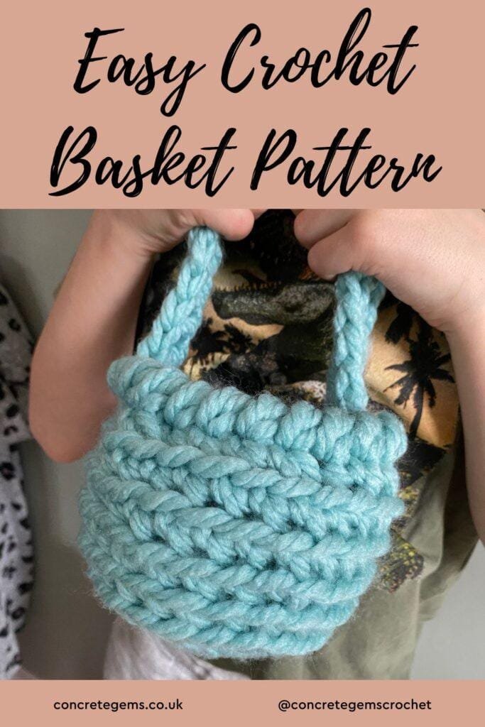 Hands of a boy holding a blue crochet basket