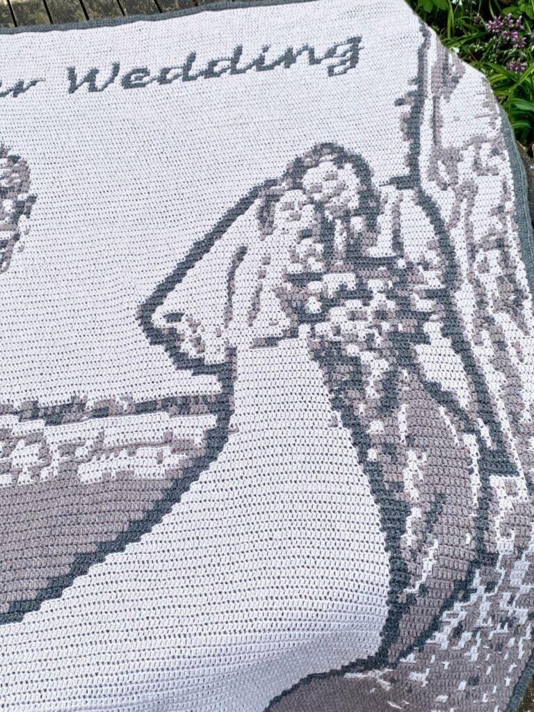close up of a heirloom wedding crochet blanket 