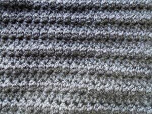 A completed sample of crochet pique stitch