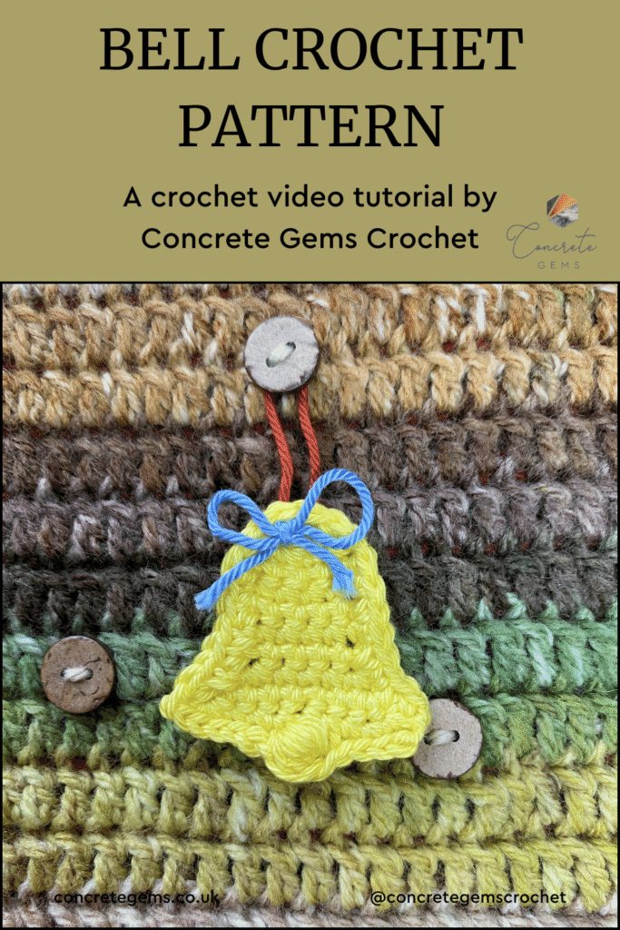 A yellow crochet bell with blue bow hangs from a green and brown crochet wall hanging