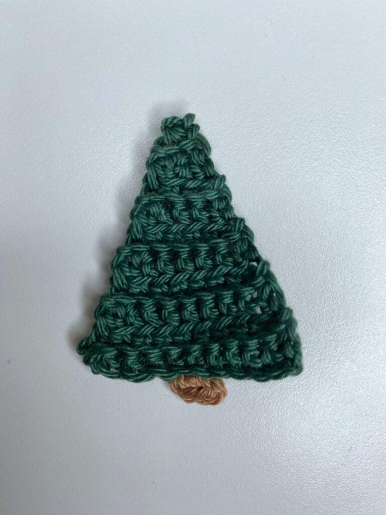 A crochet Christmas tree on a white background