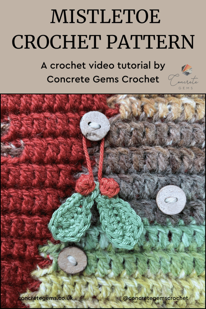 A crochet mistletoe decoration on a tree advent calendar wall hanging