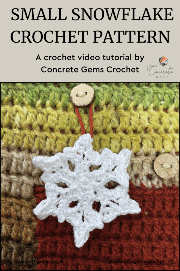 A small snowflake crochet pattern on a crocheted red and green background