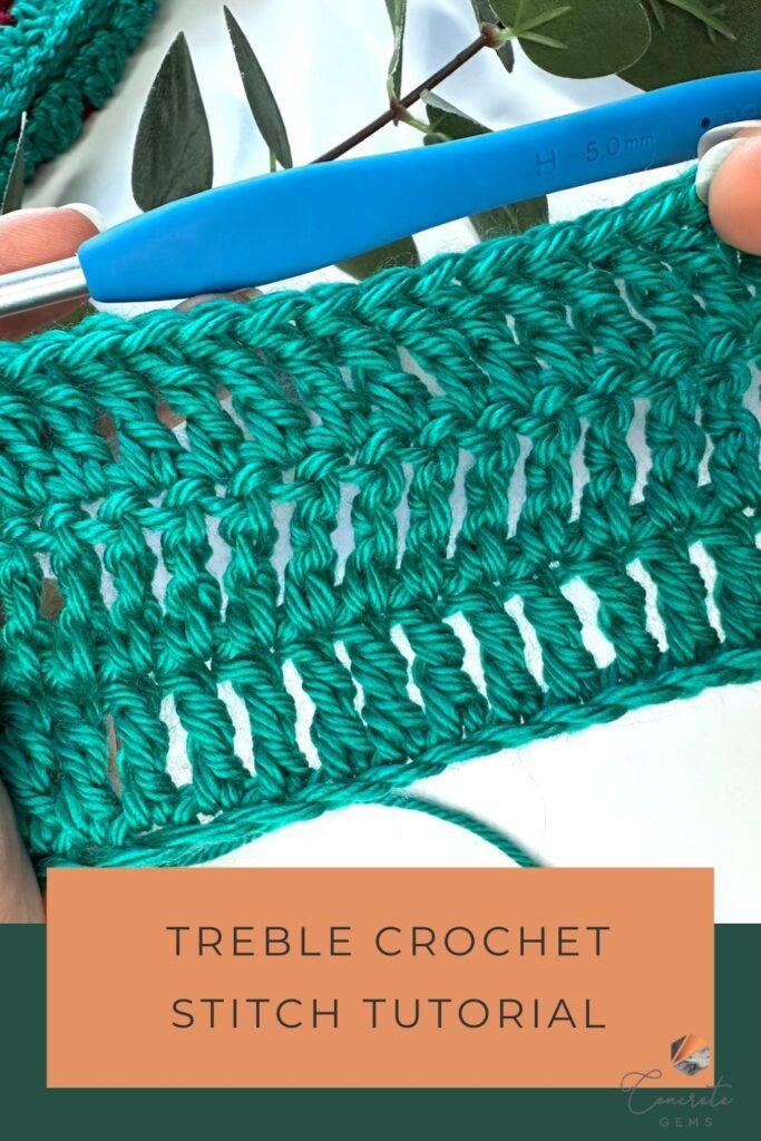 A close up swatch of 3 rows of green treble crochet stitches held by hands in front of greenery and white background and the words TREBLE CROCHET STITCH TUTORIAL in front.