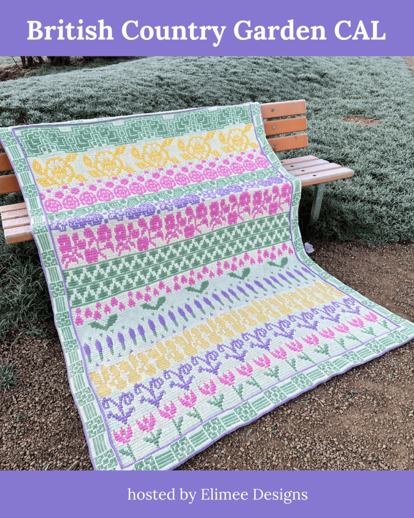A large crochet blanket featuring different coloured flowers is laid on a bench in a garden with the words BRITISH COUNTRY GARDEN CAL above