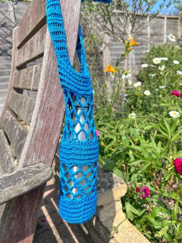 Ocean Coral crochet water bottle holder pattern - blue lace design with textured sections