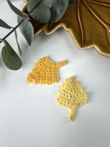 2 crochet birch leaves in different yellows
