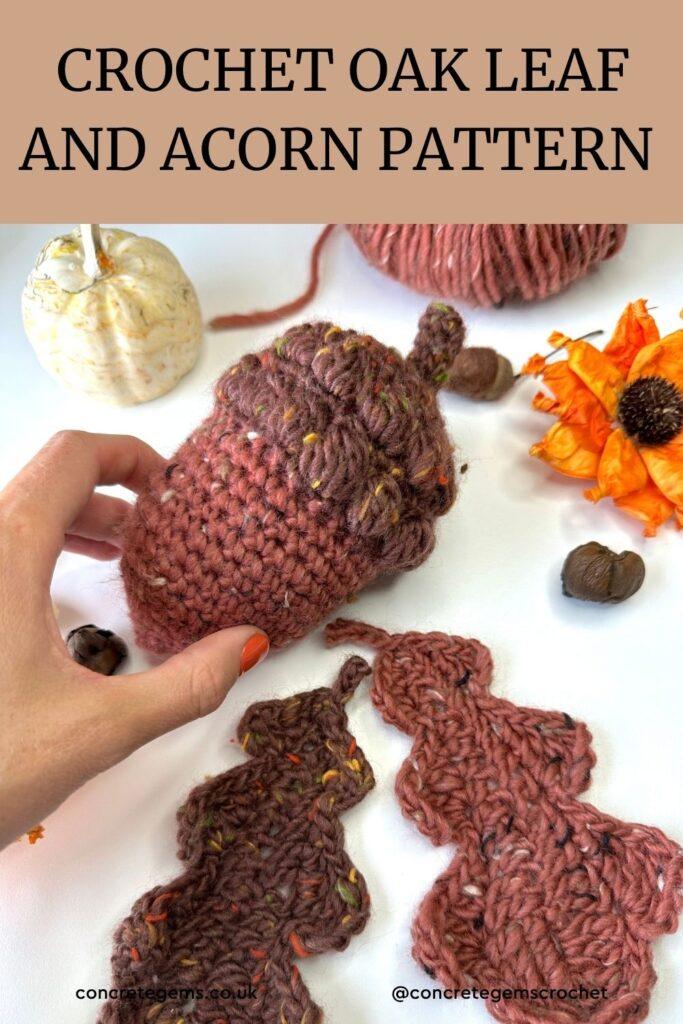 A hand touches a crochet acorn next to 2 crochet oak leaves with the words CROCHET OAK LEAF AND ACORN PATTERN